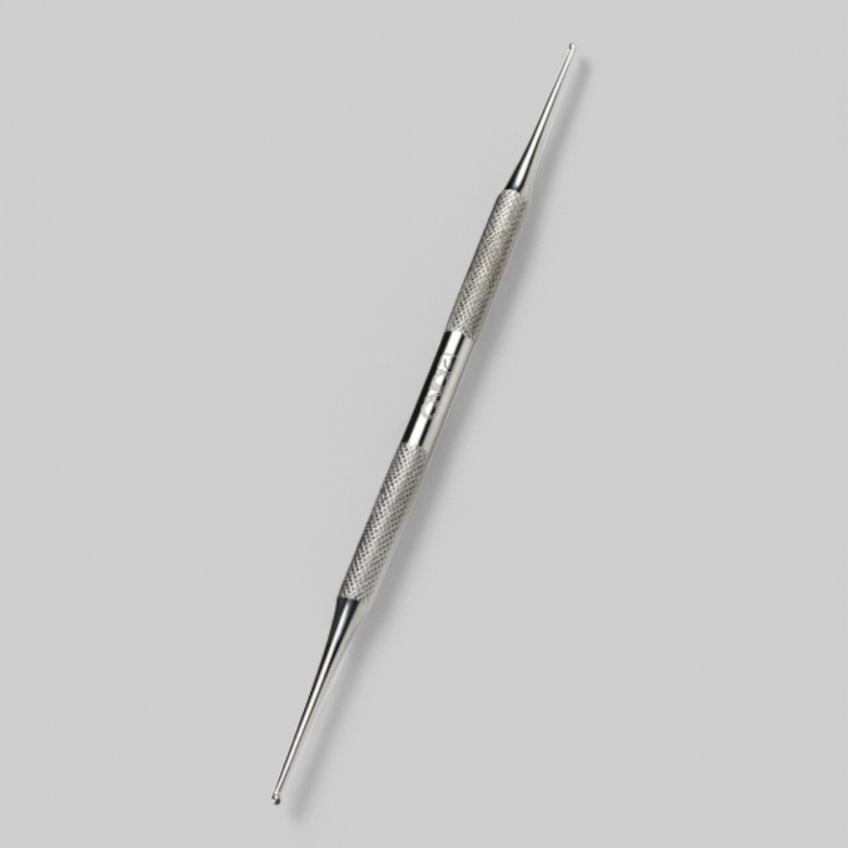 Кюретка двухсторонняя для удаления птеригия.