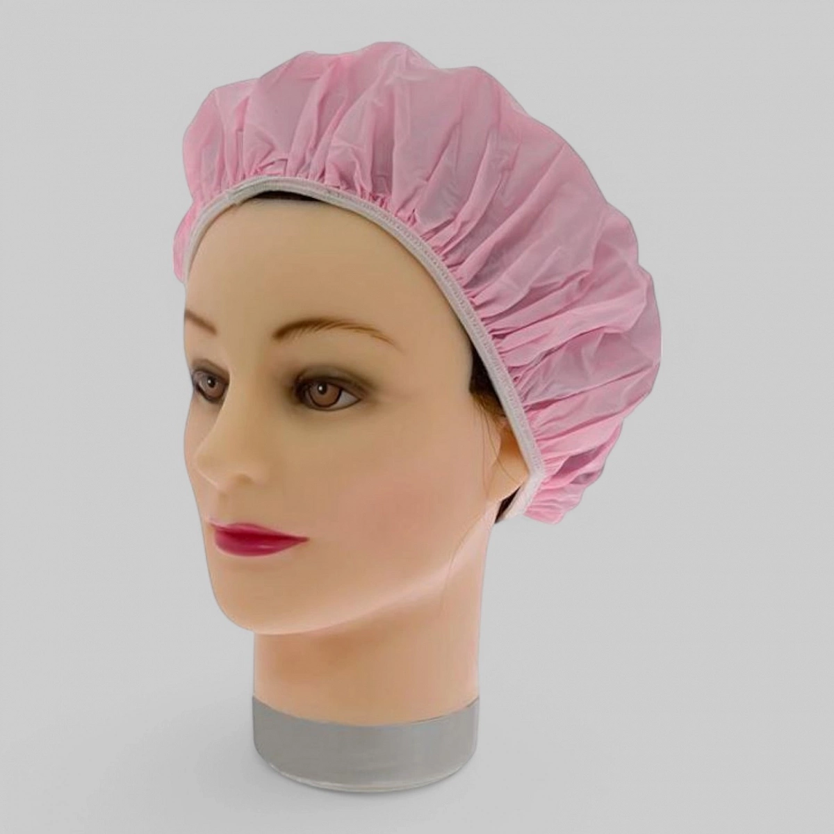 Шапочка пластиковая для душа, розовая.288